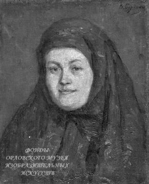 Женщина в лиловом платке